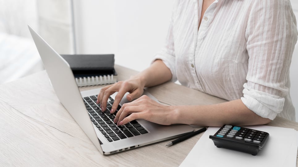close-up-woman-typing-laptop