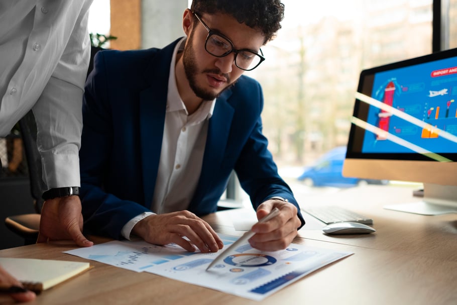 people-analyzing-checking-finance-graphs-office